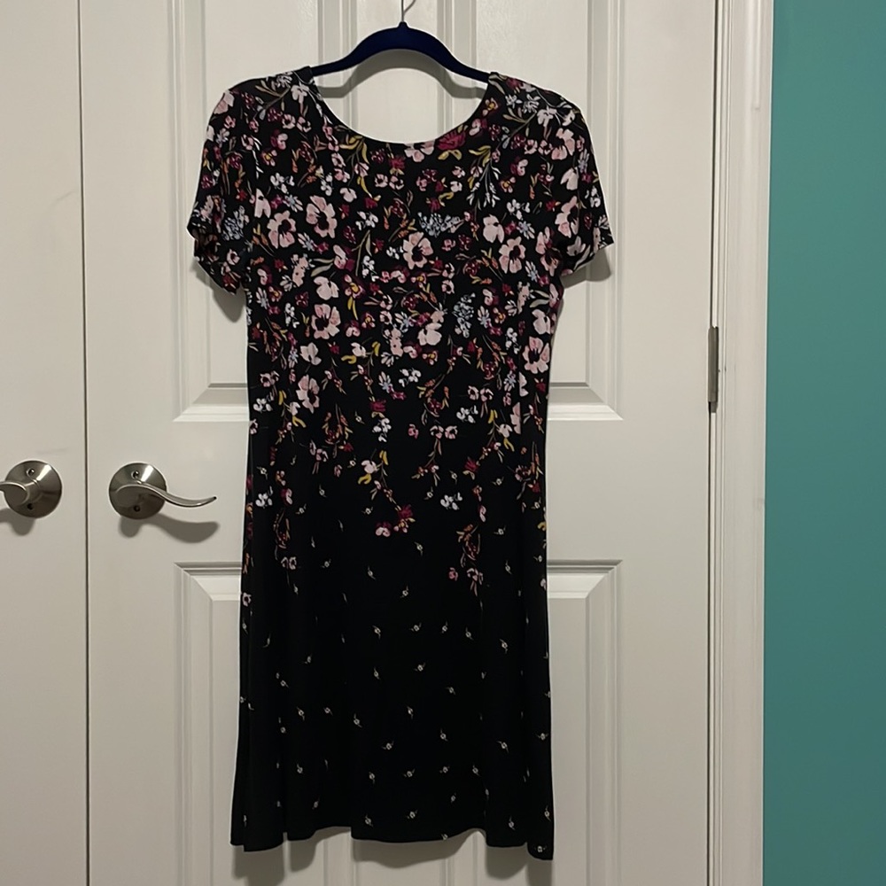 Women’s lightweight black dress with pink, white, yellow, and blue flowers.